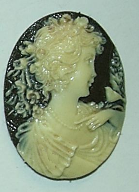Cameo - Antique Ivory Lady w/Bird on Brown - Click Image to Close