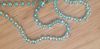 #100 Rhinestone Chain Lt. Turquoise by the FOOT - Click Image to Close